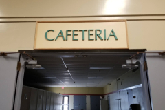 1st Floor Cafeteria (view of cafeteria sign above doorway)