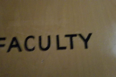 Faculty printed on 303 door