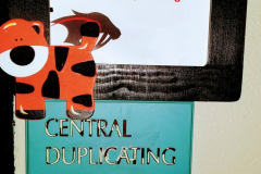 Central Duplicating Sign
