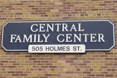 Building Exterior (west side of 5th Avenue extension with Central Family Center sign on building)(close view)