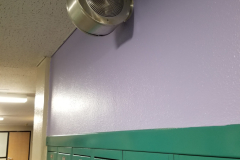 2nd Floor (Hallway looking east toward office, showing locker banks and old PA speaker)