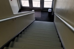 2nd Floor Hallway (stairs at south end of hallway leading to doorway below glass block mosaic)