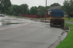 Dump truck by Thistle Lane Vierling Drive flooding