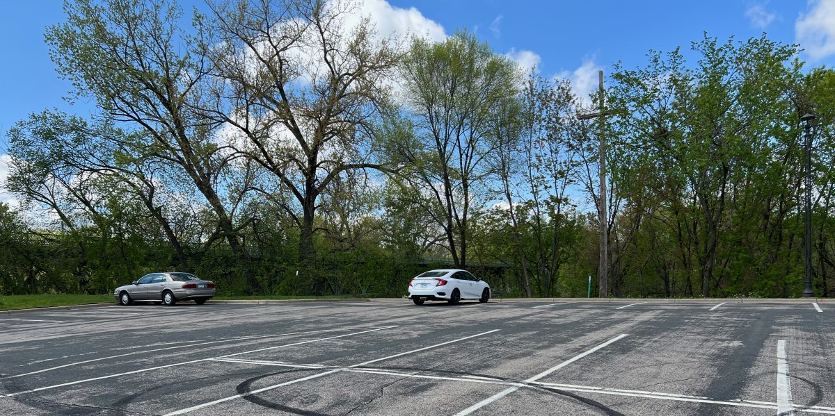 Huber Park parking lot, site of former electric utility building (May 2024)